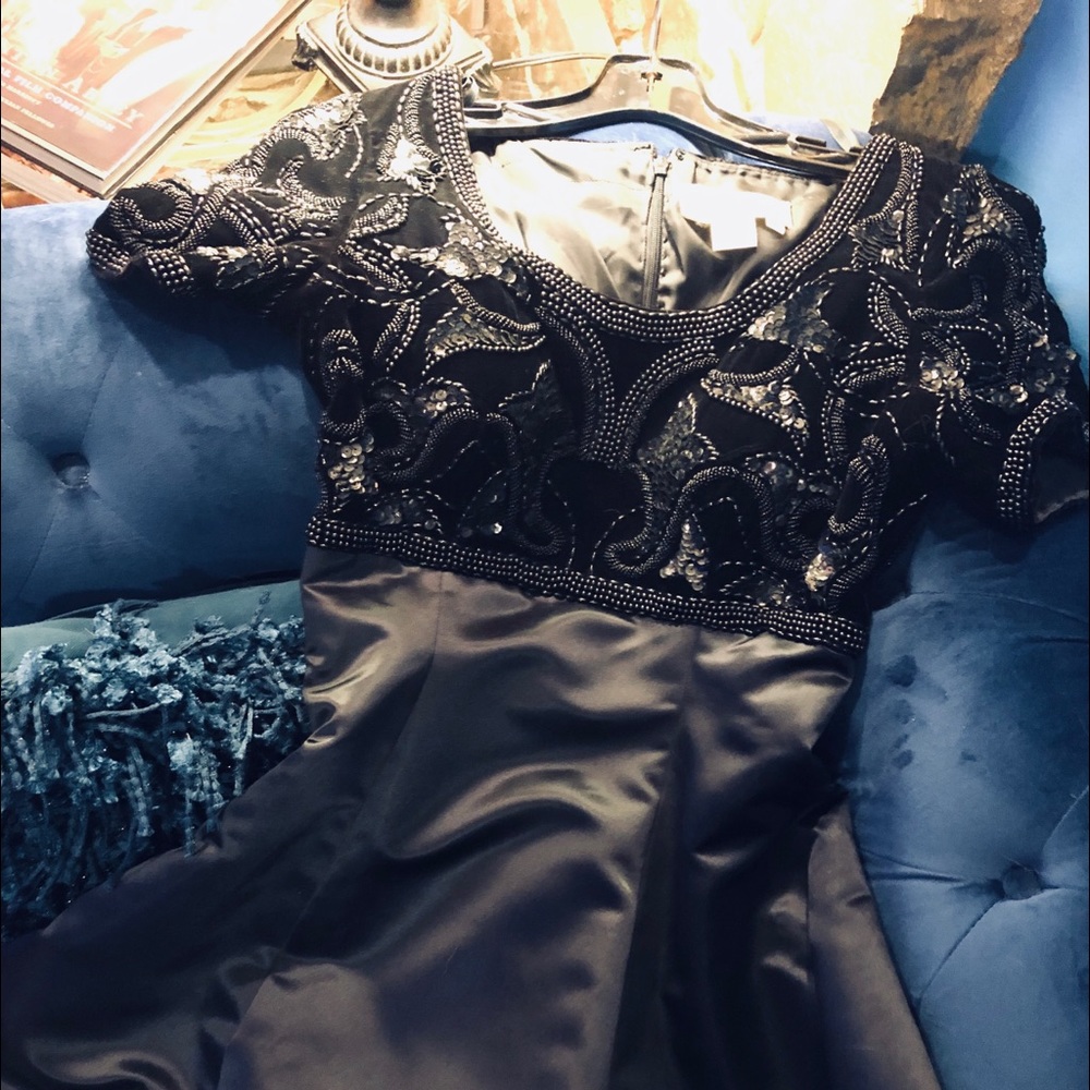 Black beaded, satin and velvet ball gown.